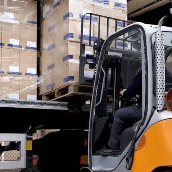 Same day courier delivering an urgent package to a business client in Coventry.